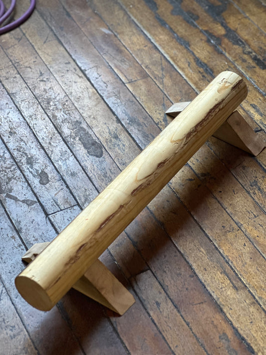 Top view of hand-routed 3-inch thick wooden parallette for grip strength training by Rough Road Fitness.