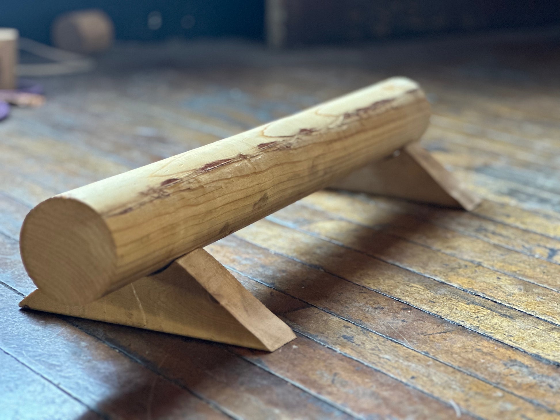 Back view of hand-routed 3-inch thick wooden parallette for grip strength training by Rough Road Fitness.